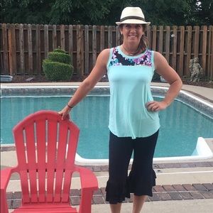 Black ruffled Capri pants